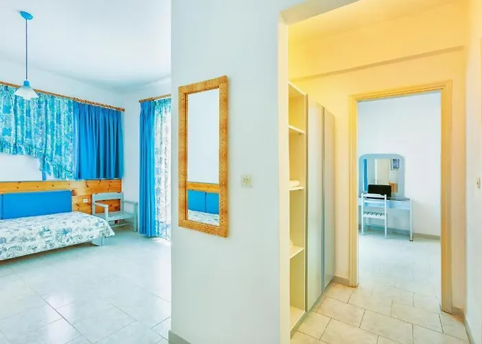 Апартаменты Xenios Faros Посиди